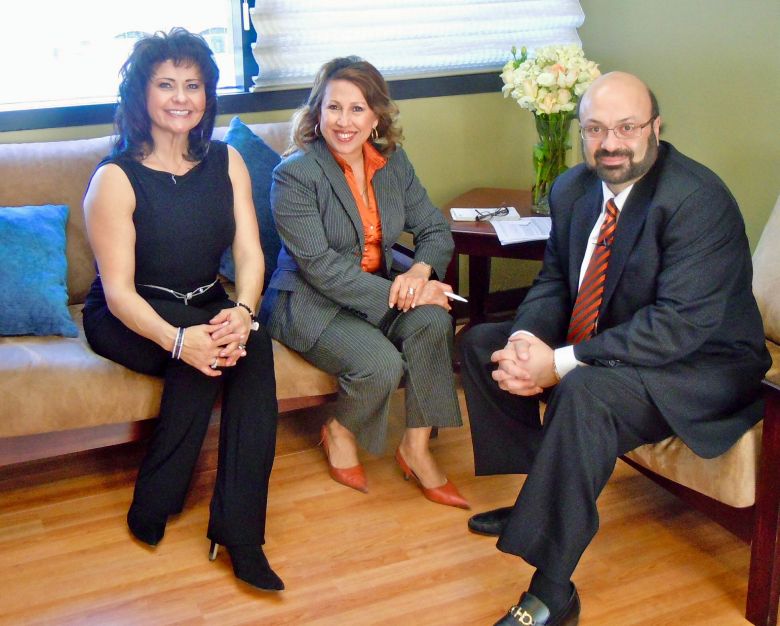 Dr. Davtyan with two women in office