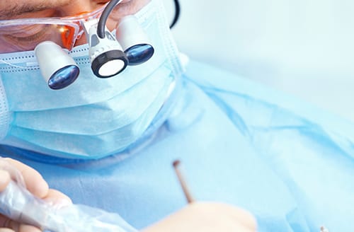 A surgeon performing baritric revision surgery.
